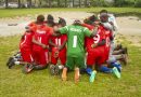 "Solidarity" female football team , kneeling for prayers before confronting "Unity" female soccer team in opening match